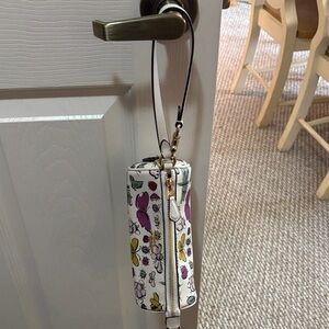 New never used Coach Bug purse/wristlet